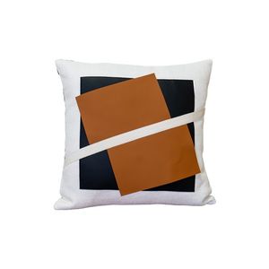 SADAF Layered Black and Brown Panel Pillow with a Diagonal Strap Accent